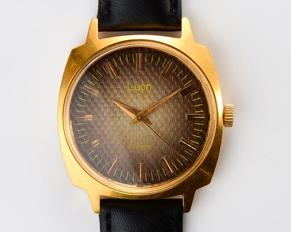 Luch vintage Soviet gold-plated watch with intricate dial