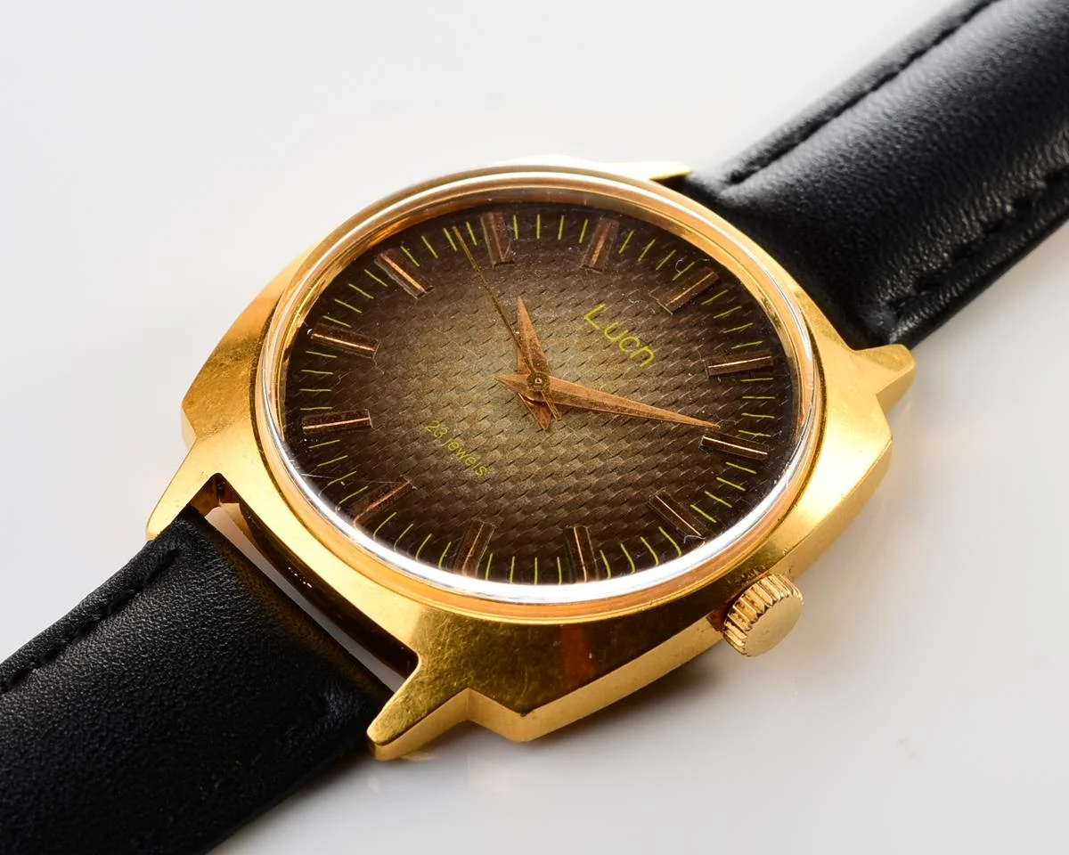 Luch vintage Soviet gold-plated watch with intricate dial