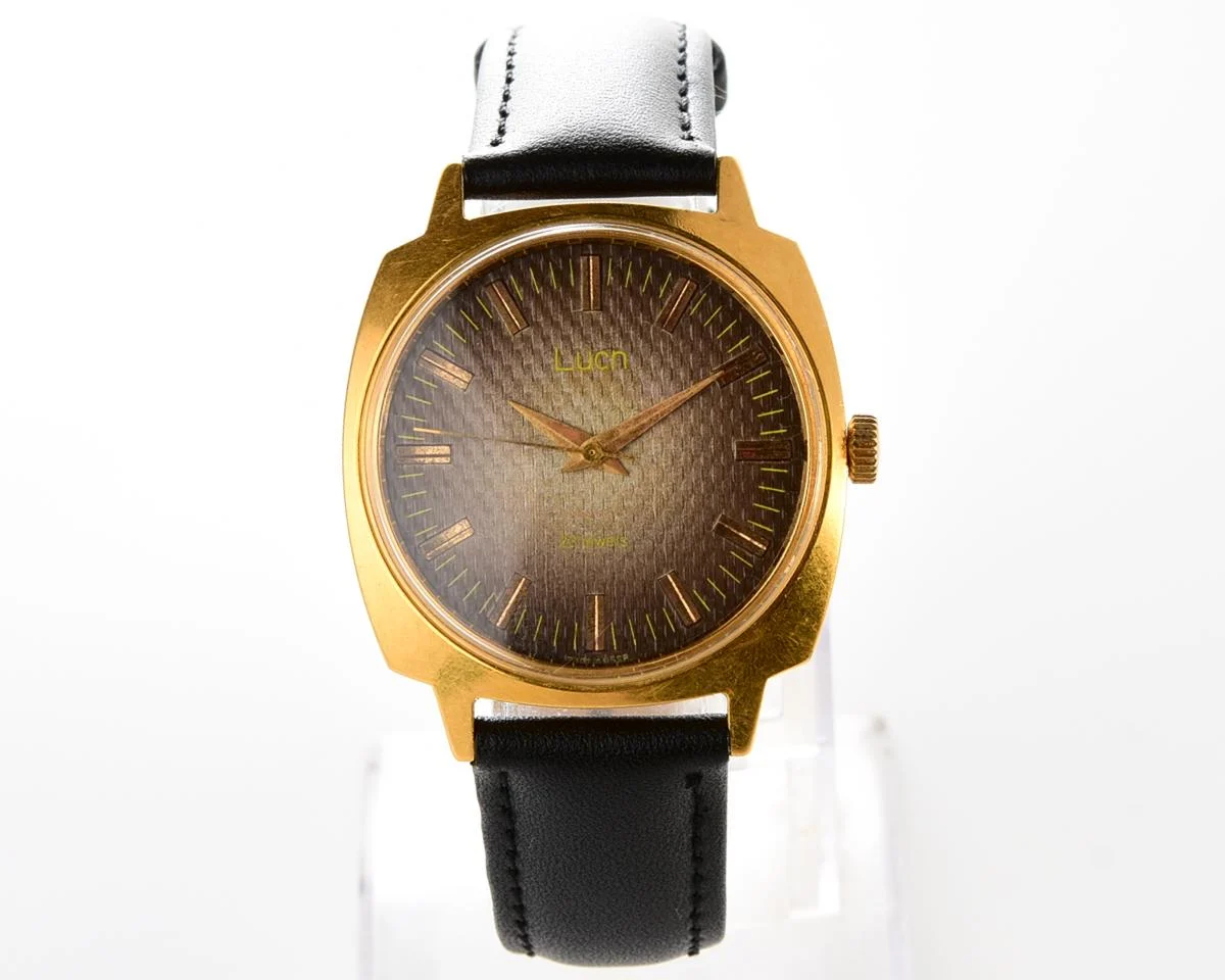 Luch vintage Soviet gold-plated watch with intricate dial