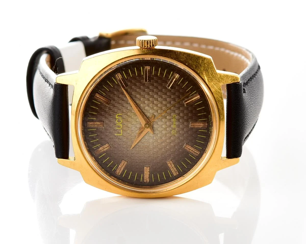 Luch vintage Soviet gold-plated watch with intricate dial