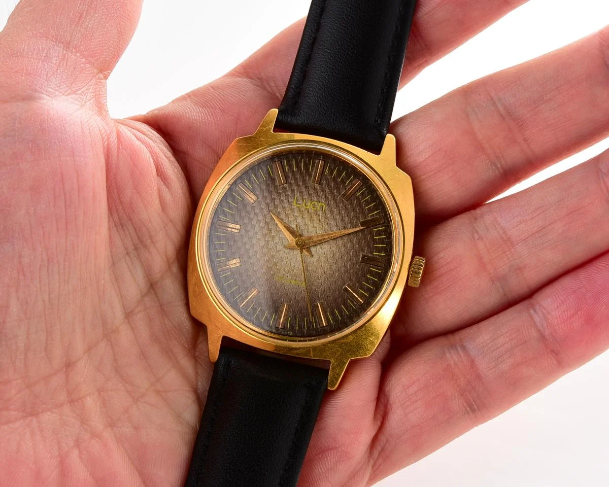 Luch vintage Soviet gold-plated watch with intricate dial