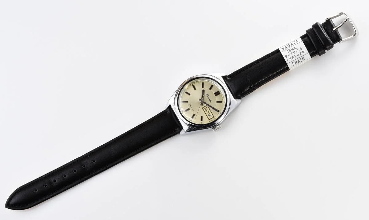 Vintage Soviet mechanical Raketa watch with double calendar