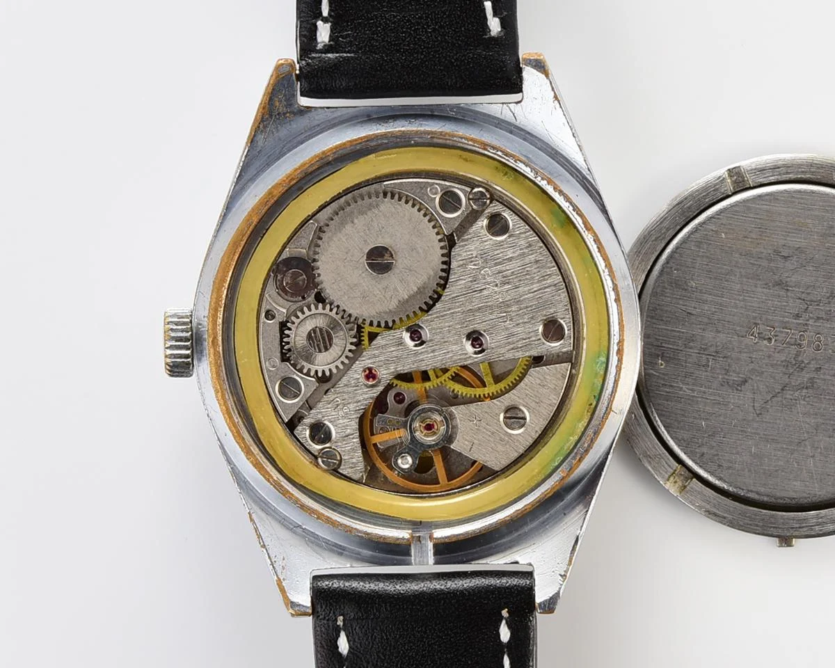Vintage Soviet mechanical Raketa watch with double calendar