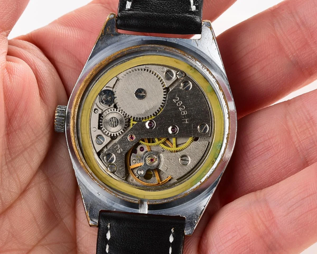 Vintage Soviet mechanical Raketa watch with double calendar