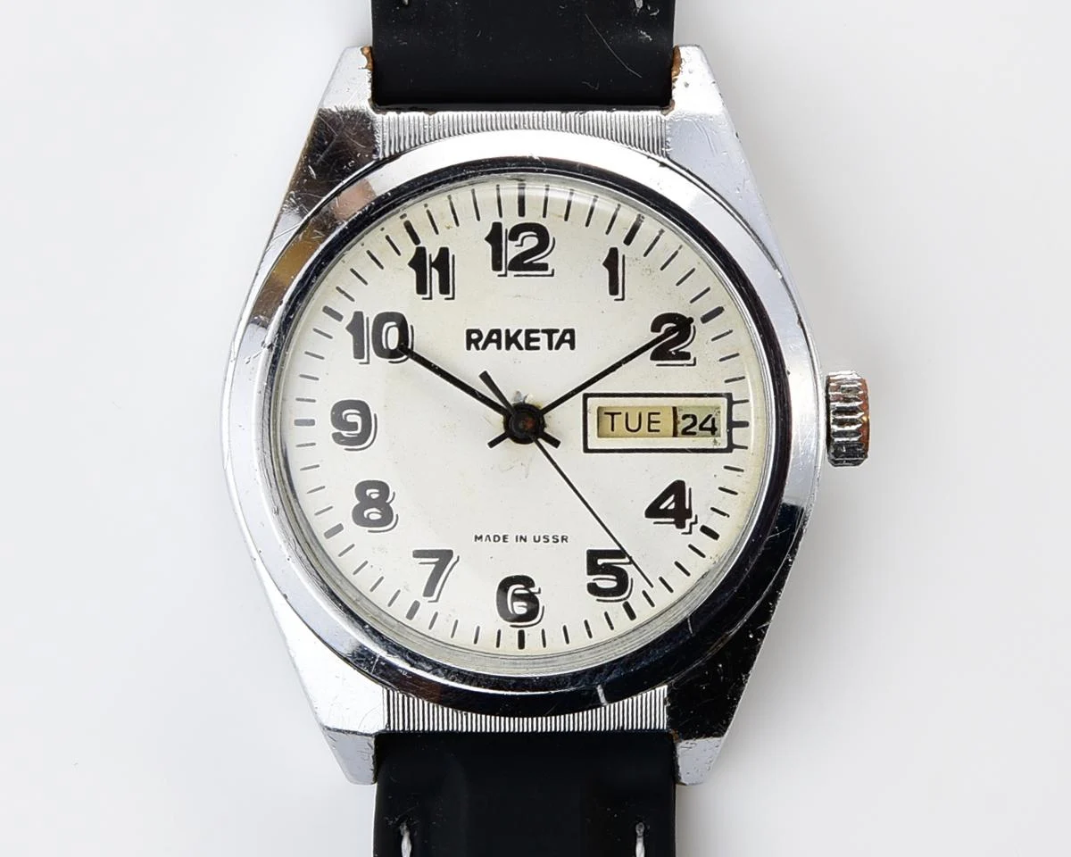 Vintage Soviet mechanical Raketa watch with double calendar