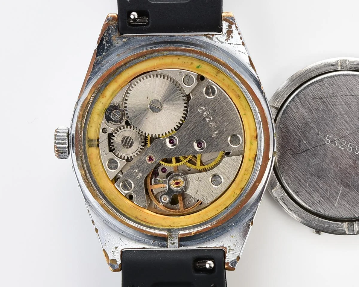 Vintage Soviet mechanical Raketa watch with double calendar