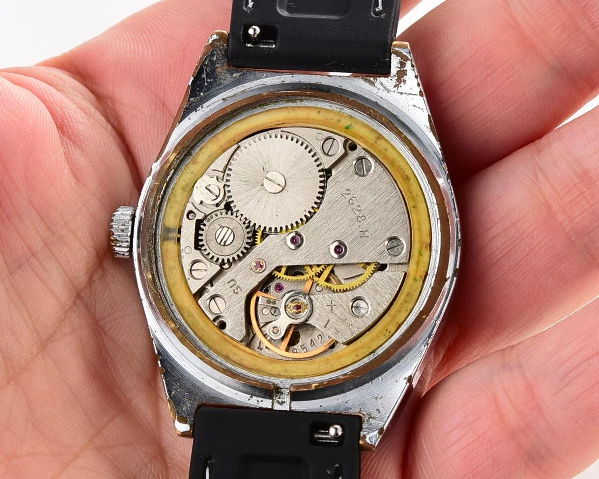 Vintage Soviet mechanical Raketa watch with double calendar