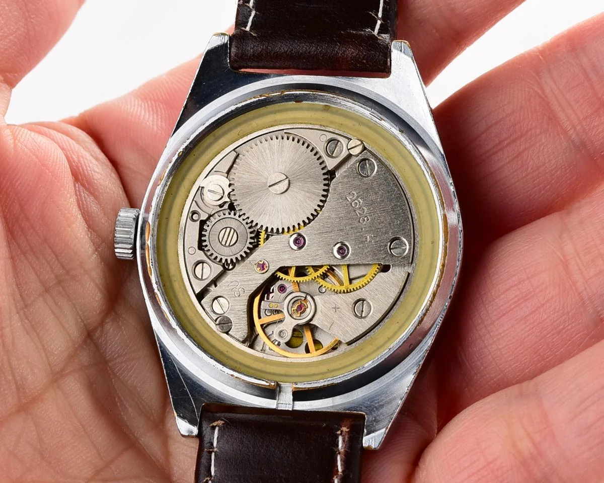 Vintage Soviet mechanical Raketa watch with double calendar