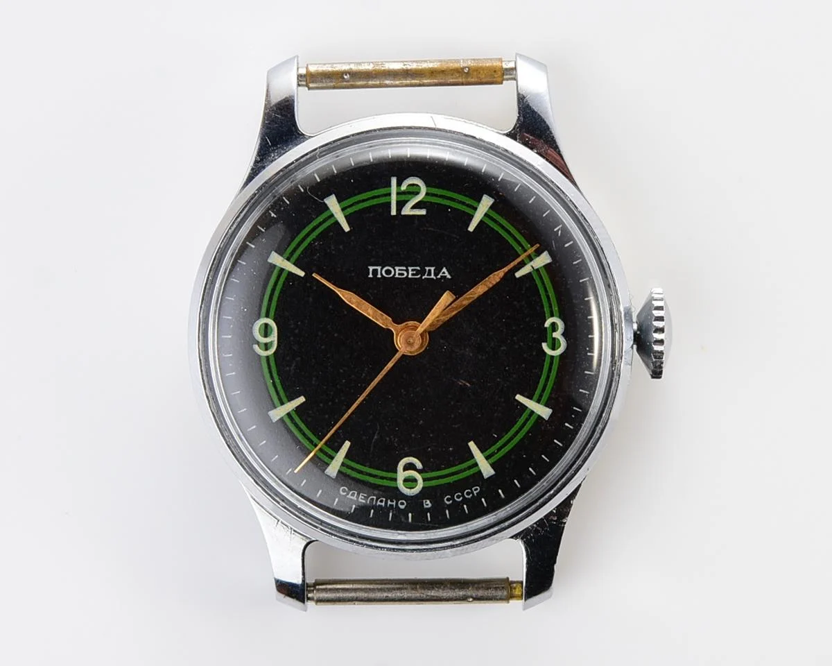 Vintage Soviet mechanical Pobeda with central seconds hand and diamond shaped crown