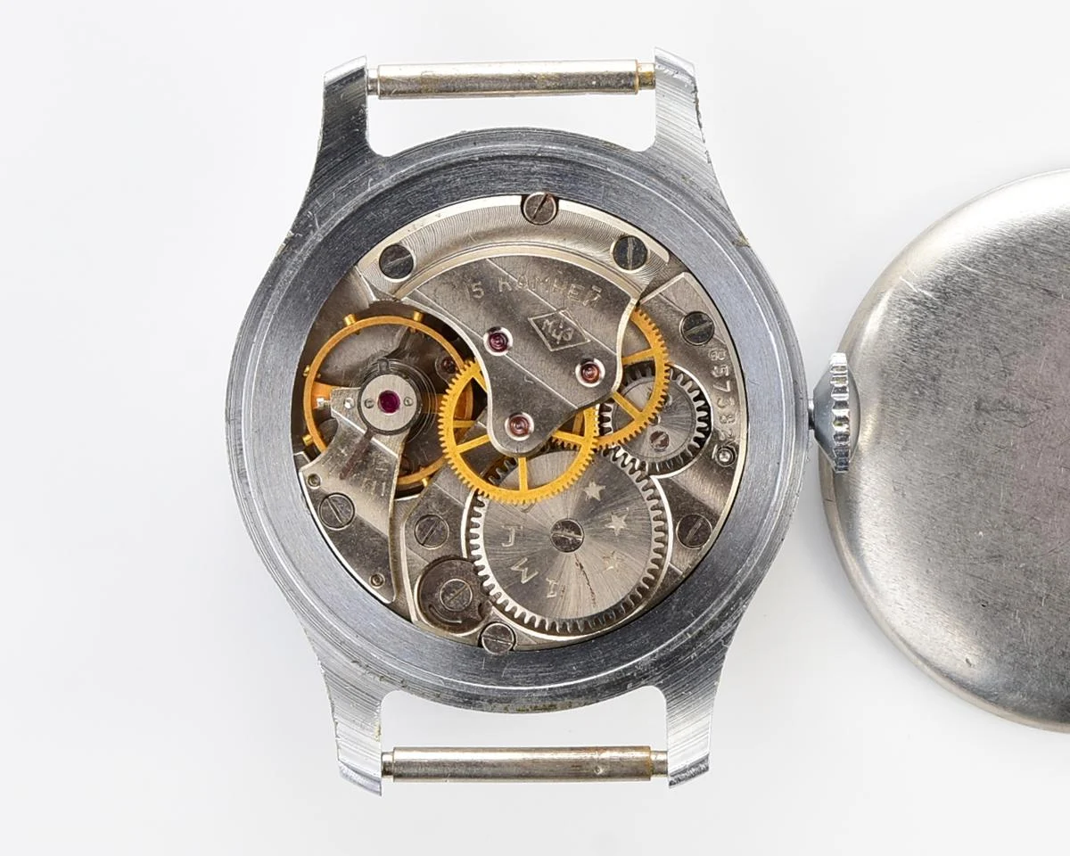 Vintage Soviet mechanical Pobeda with central seconds hand and diamond shaped crown