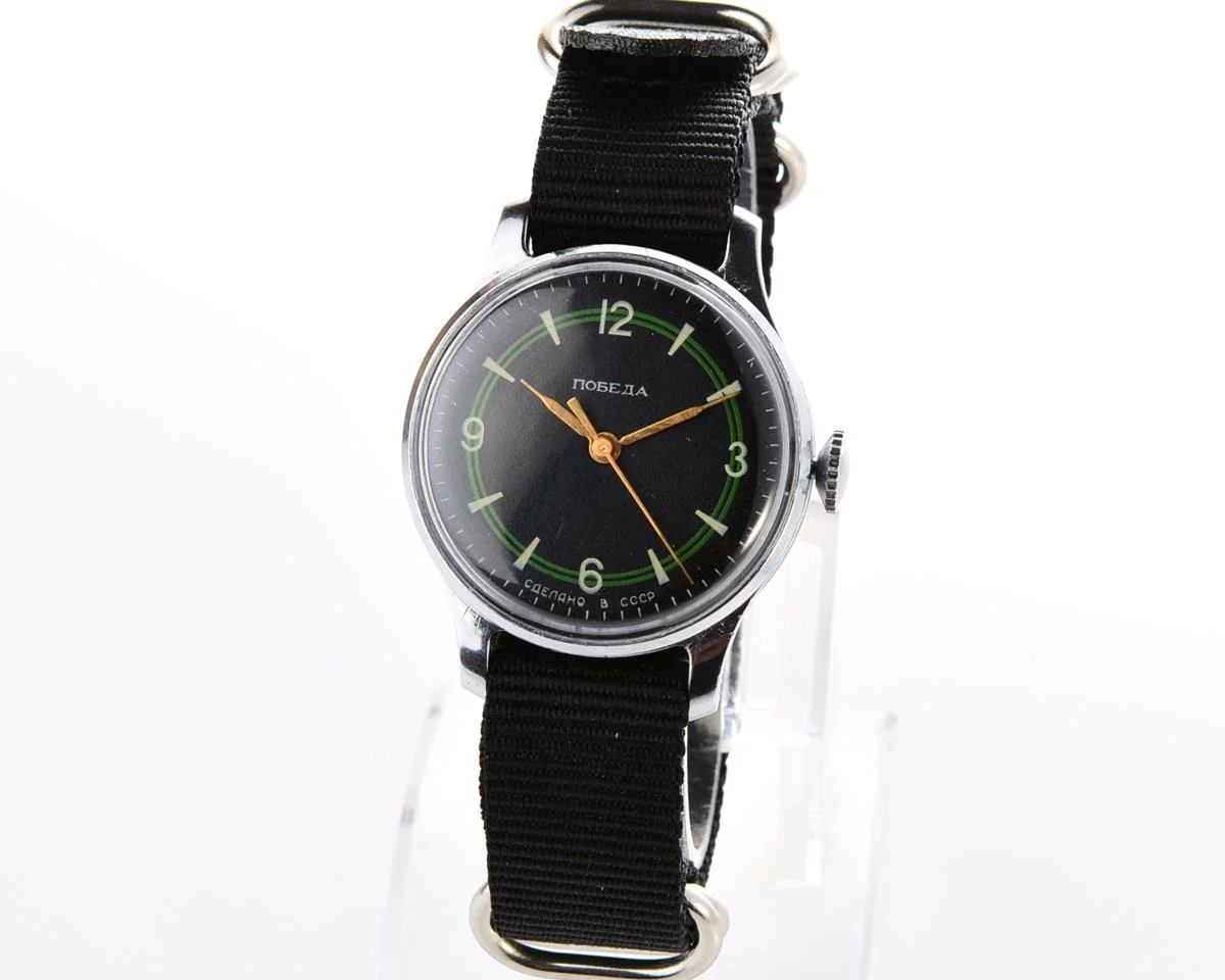 Vintage Soviet mechanical Pobeda with central seconds hand and diamond shaped crown