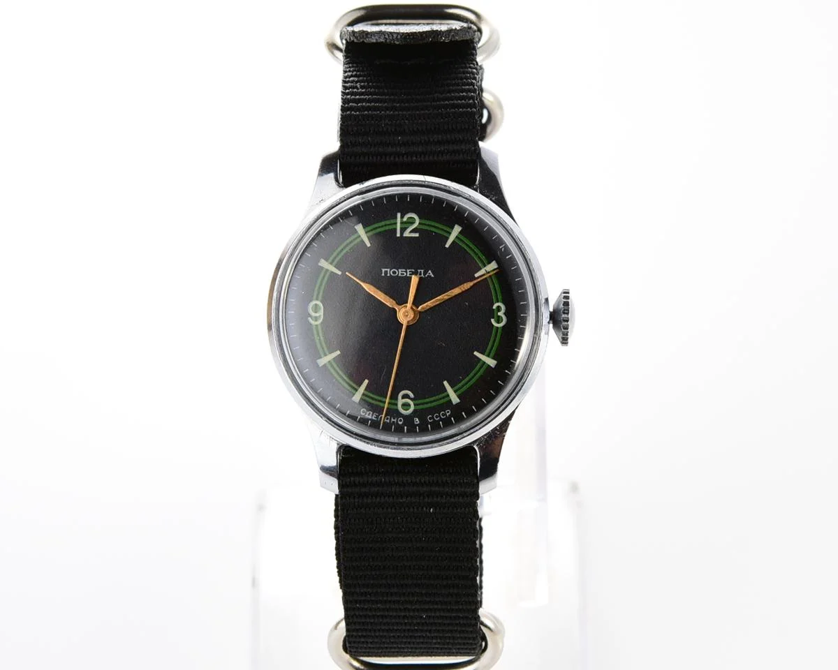 Vintage Soviet mechanical Pobeda with central seconds hand and diamond shaped crown