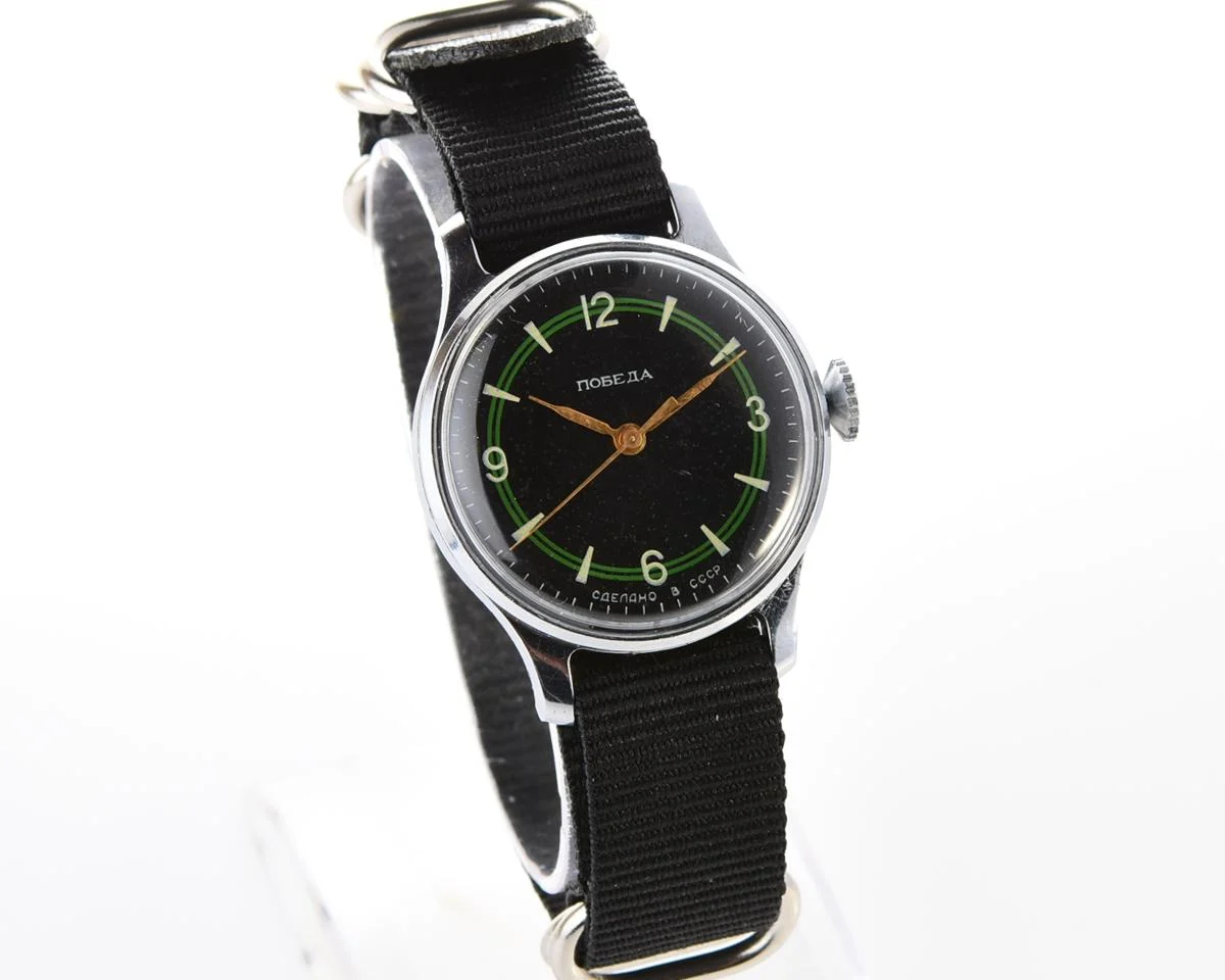 Vintage Soviet mechanical Pobeda with central seconds hand and diamond shaped crown