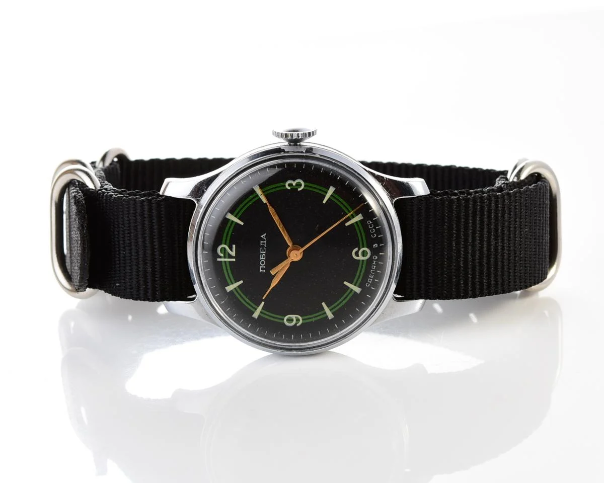 Vintage Soviet mechanical Pobeda with central seconds hand and diamond shaped crown