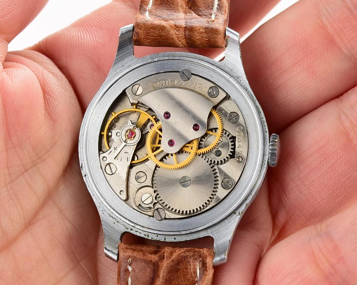 Vintage Pobeda watch with central second hand