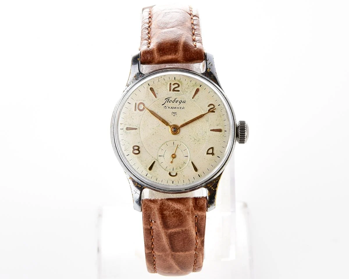 Vintage Soviet mechanical Pobeda wrist watch from 1st quarter 1957