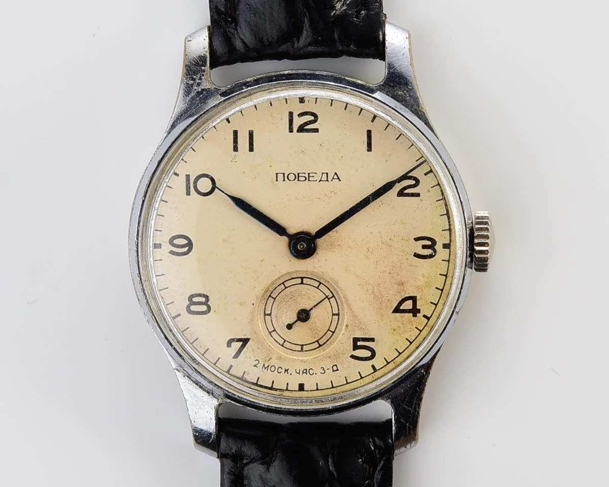 Vintage Soviet mechanical Pobeda wrist watch from 3rd quarter 1954