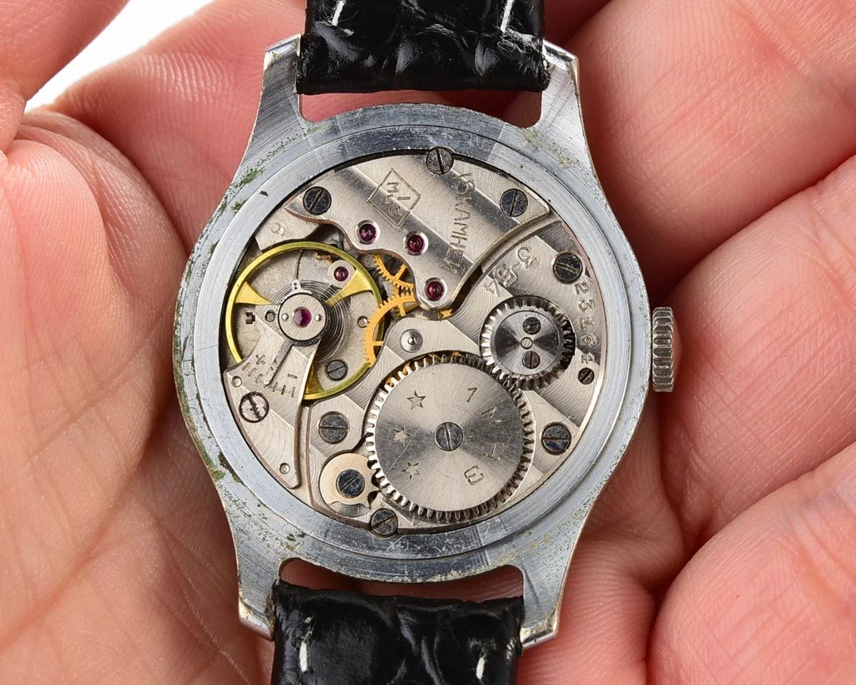 Vintage Soviet mechanical Pobeda wrist watch from 3rd quarter 1954