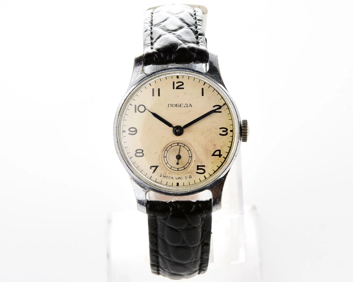 Vintage Soviet mechanical Pobeda wrist watch from 3rd quarter 1954
