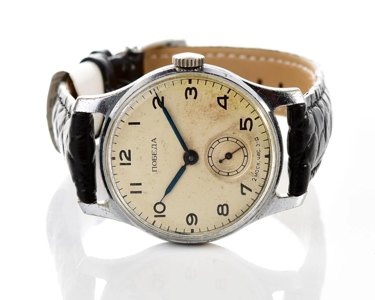 Vintage Soviet mechanical Pobeda wrist watch from 3rd quarter 1954