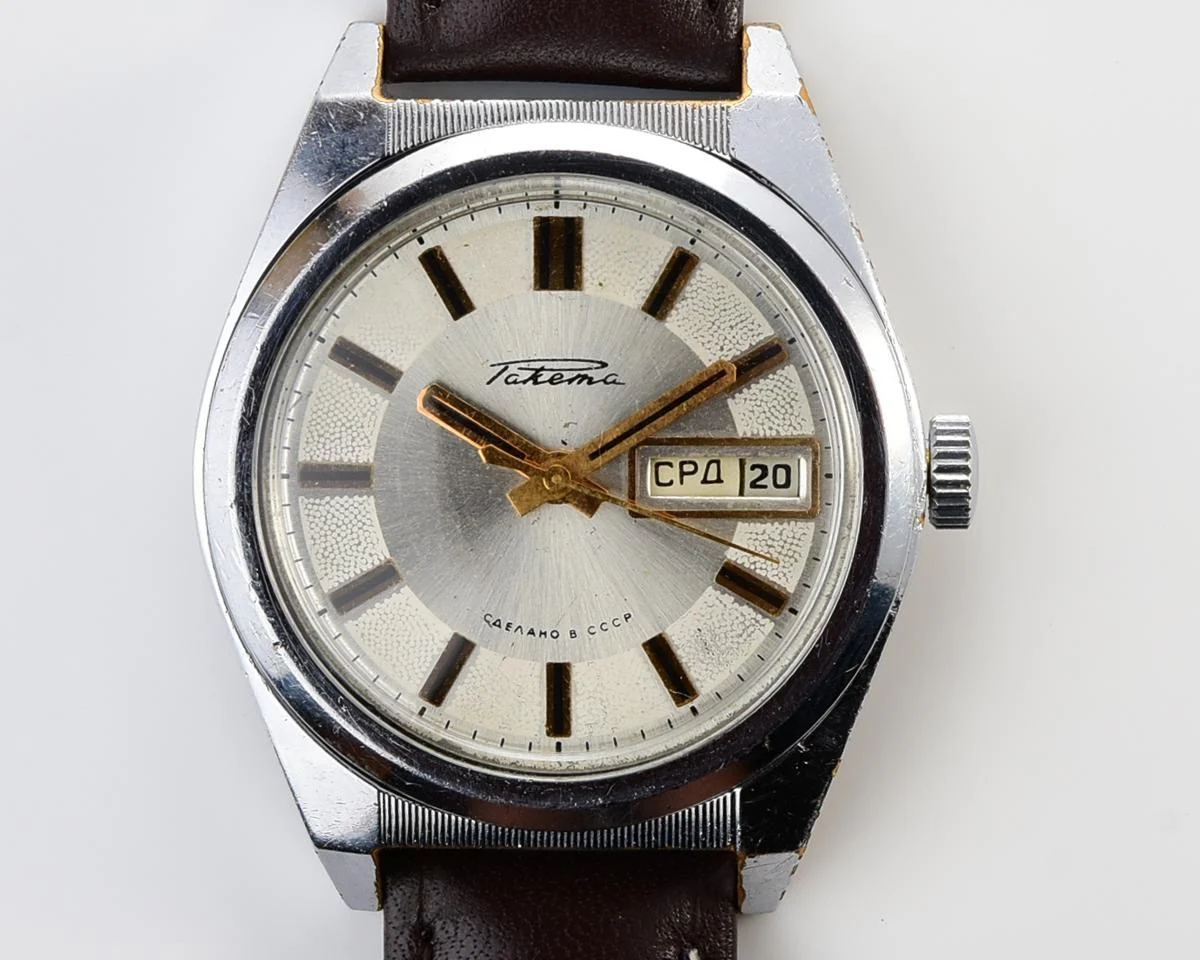 Vintage Soviet mechanical Raketa watch with double calendar with engraved back