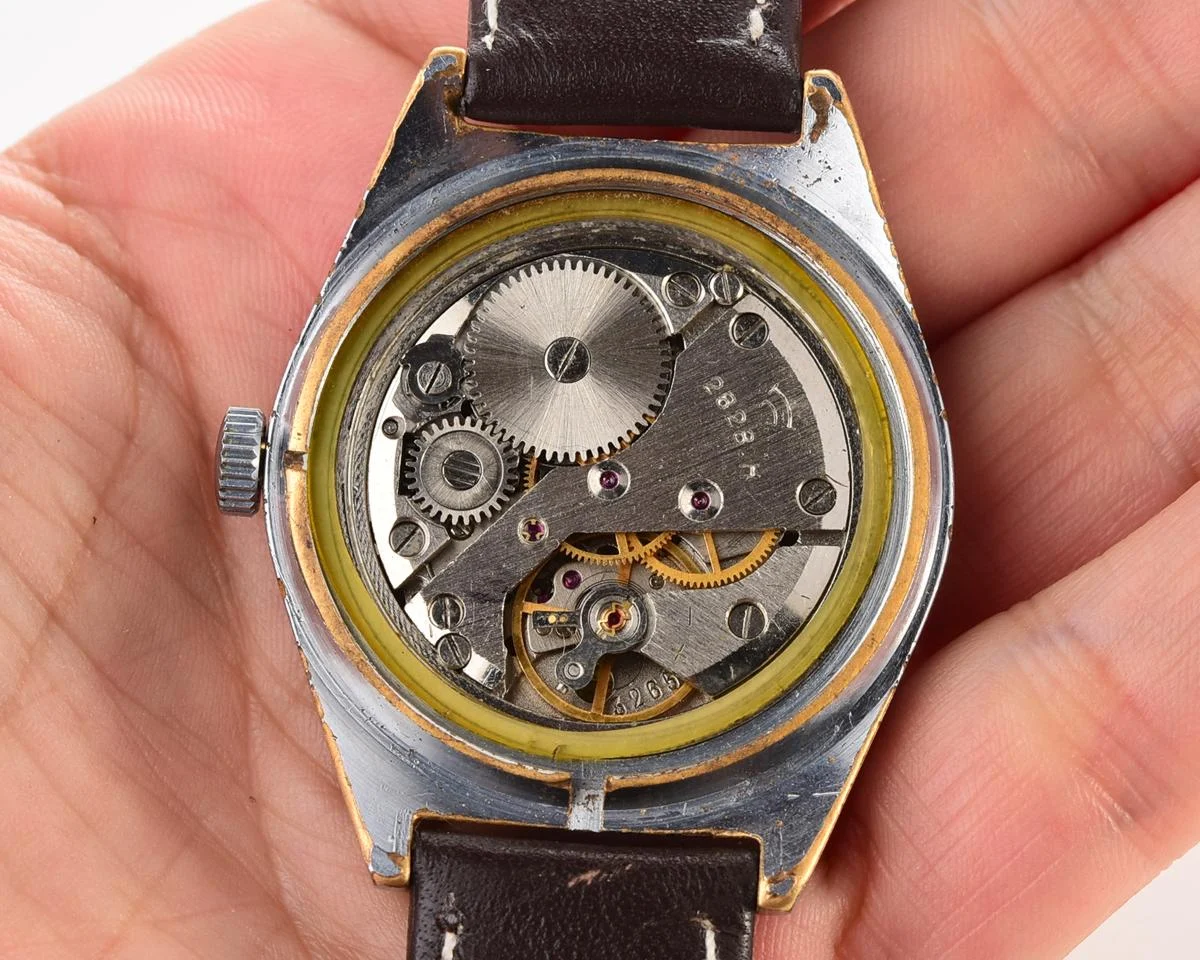 Vintage Soviet mechanical Raketa watch with double calendar with engraved back