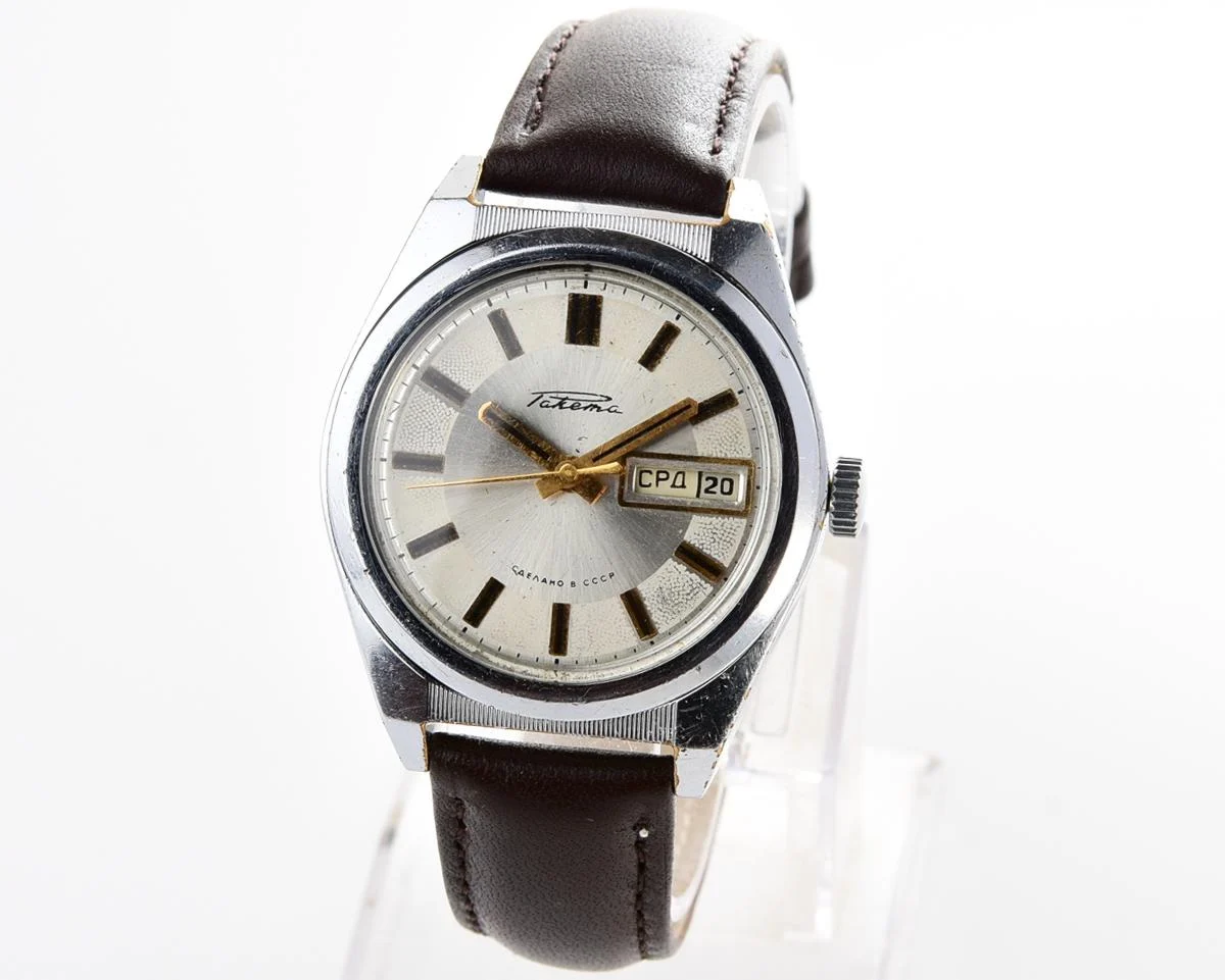 Vintage Soviet mechanical Raketa watch with double calendar with engraved back