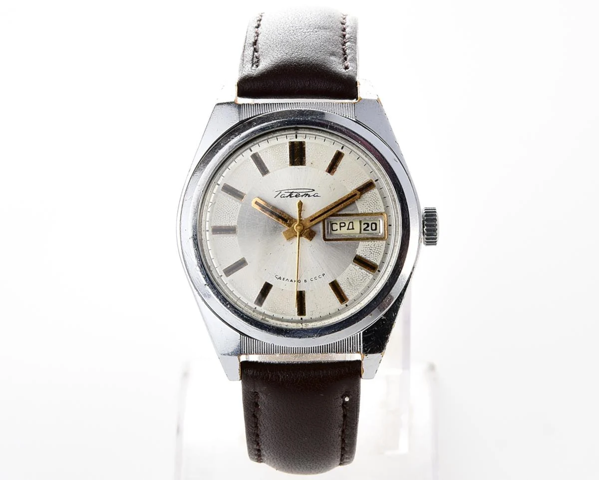 Vintage Soviet mechanical Raketa watch with double calendar with engraved back