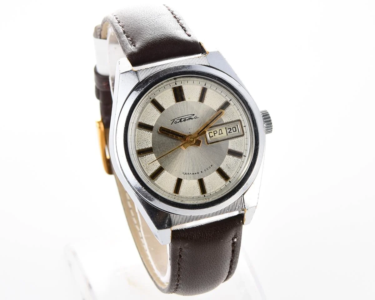 Vintage Soviet mechanical Raketa watch with double calendar with engraved back