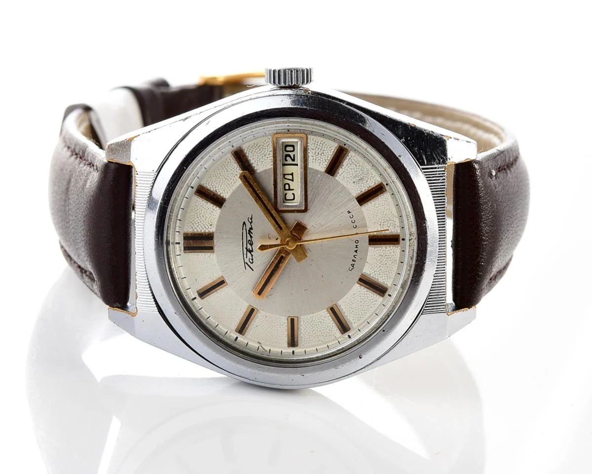 Vintage Soviet mechanical Raketa watch with double calendar with engraved back