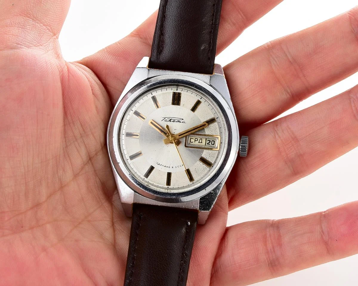 Vintage Soviet mechanical Raketa watch with double calendar with engraved back