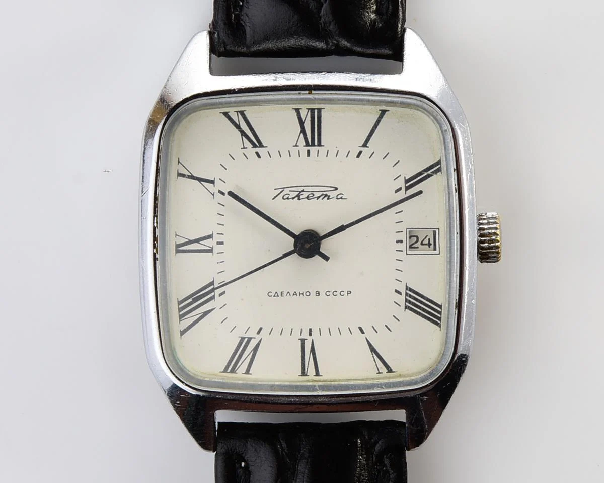 Vintage Soviet Raketa mechanical watch with roman dial and engraved back