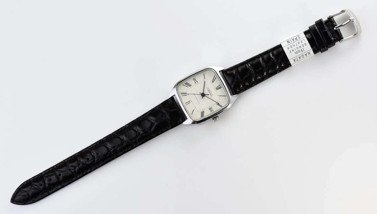 Vintage Soviet Raketa mechanical watch with roman dial and engraved back