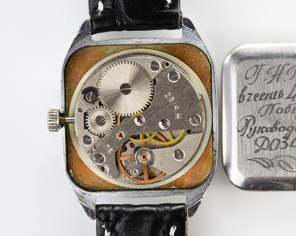 Vintage Soviet Raketa mechanical watch with roman dial and engraved back