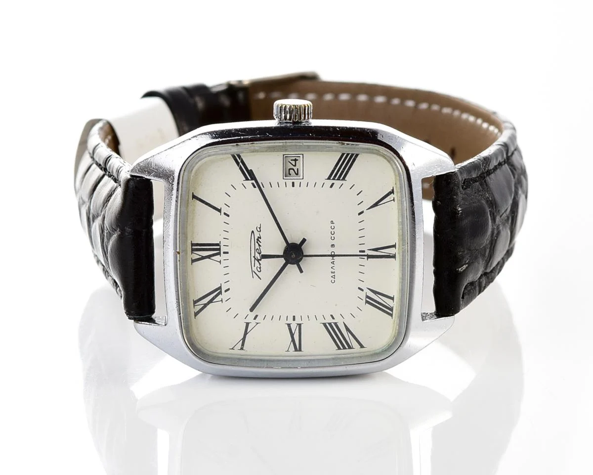 Vintage Soviet Raketa mechanical watch with roman dial and engraved back