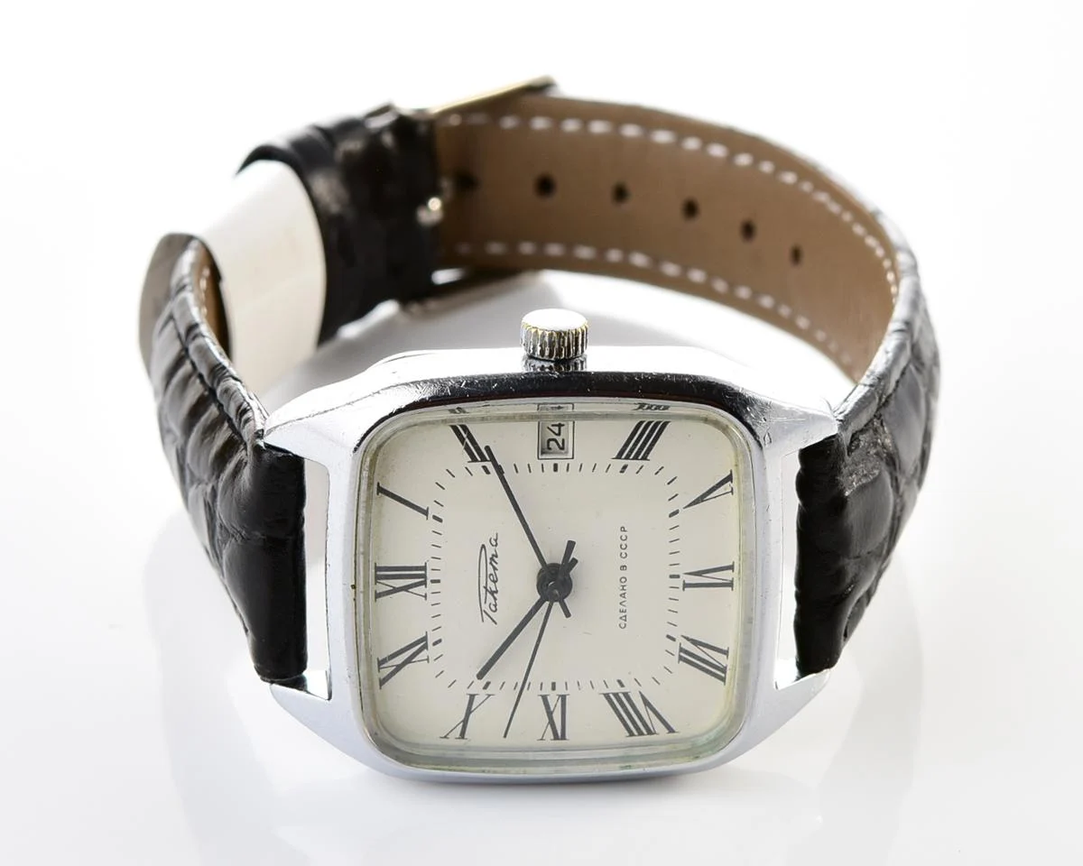 Vintage Soviet Raketa mechanical watch with roman dial and engraved back