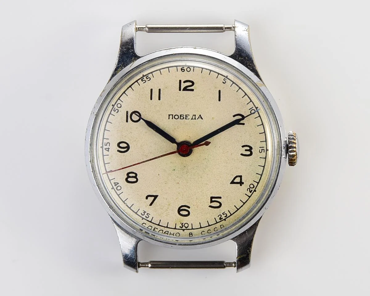 Vintage Pobeda watch with central seconds hand