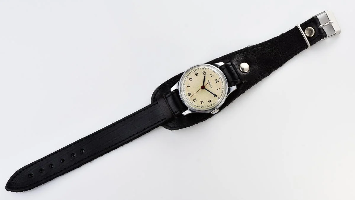 Vintage Pobeda watch with central seconds hand