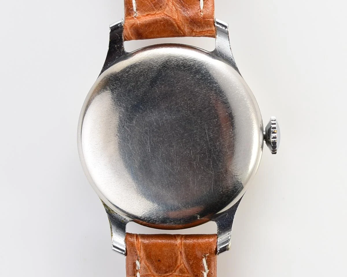 Excellent vintage Pobeda watch with central seconds hand and diamond shaped crown!
