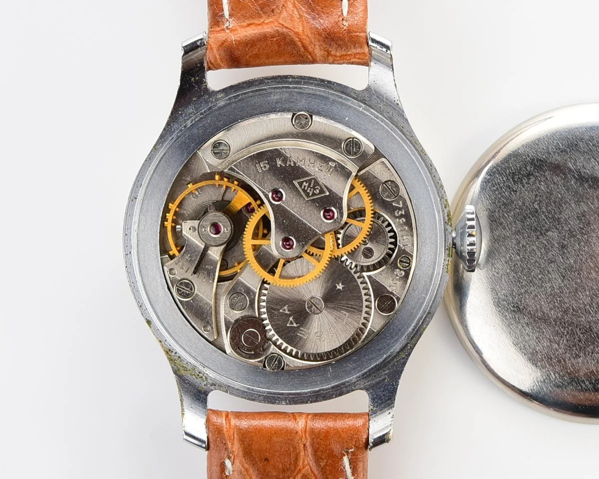 Excellent vintage Pobeda watch with central seconds hand and diamond shaped crown!
