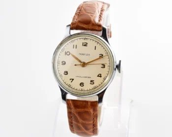 Excellent vintage Pobeda watch with central seconds hand and diamond shaped crown!
