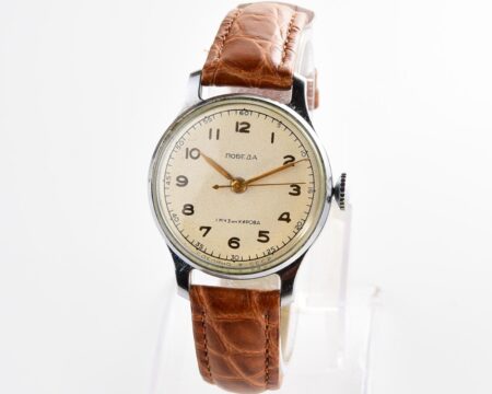 Excellent vintage POBEDA watch with central seconds hand and diamond shaped crown!
