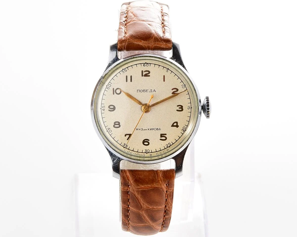 Excellent vintage Pobeda watch with central seconds hand and diamond shaped crown!