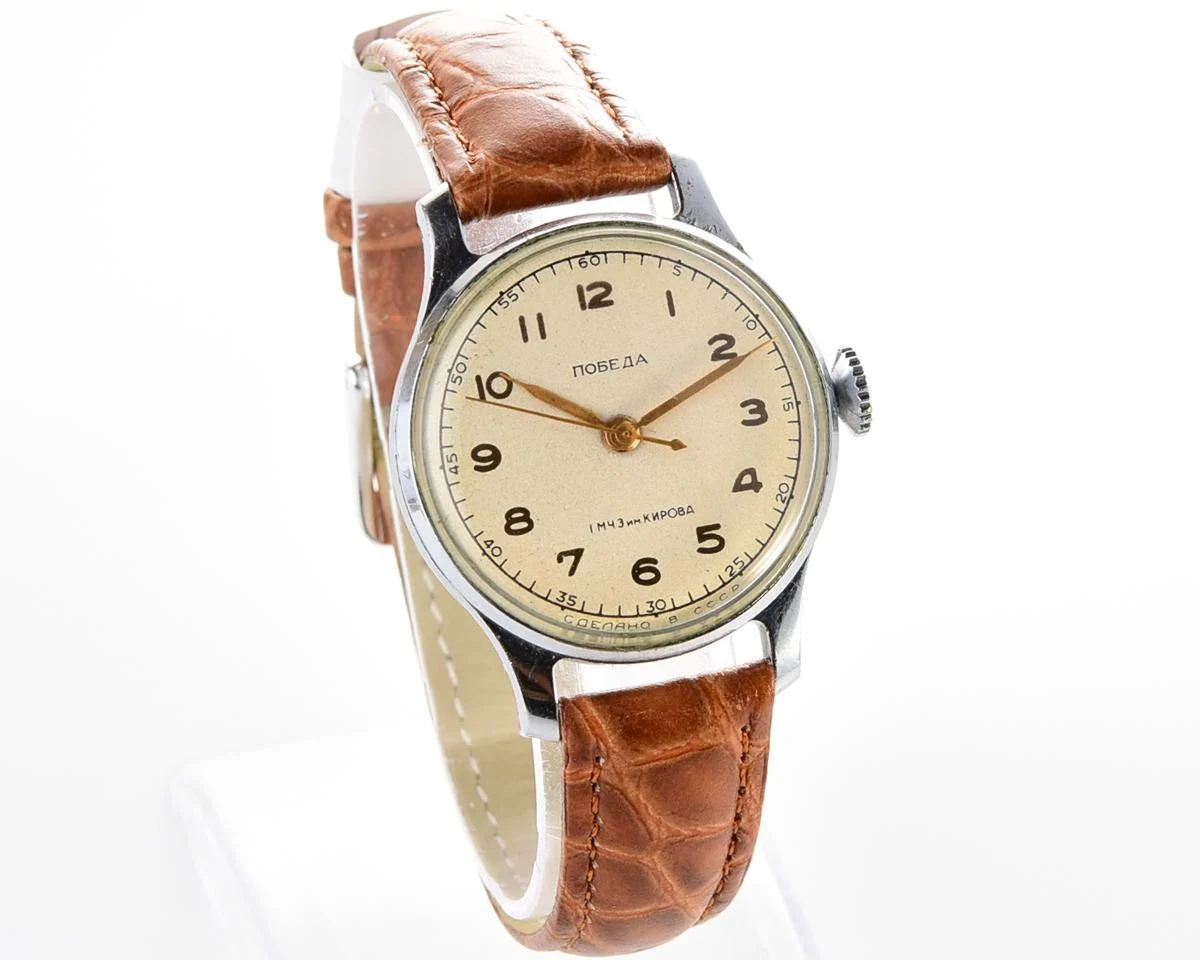 Excellent vintage Pobeda watch with central seconds hand and diamond shaped crown!
