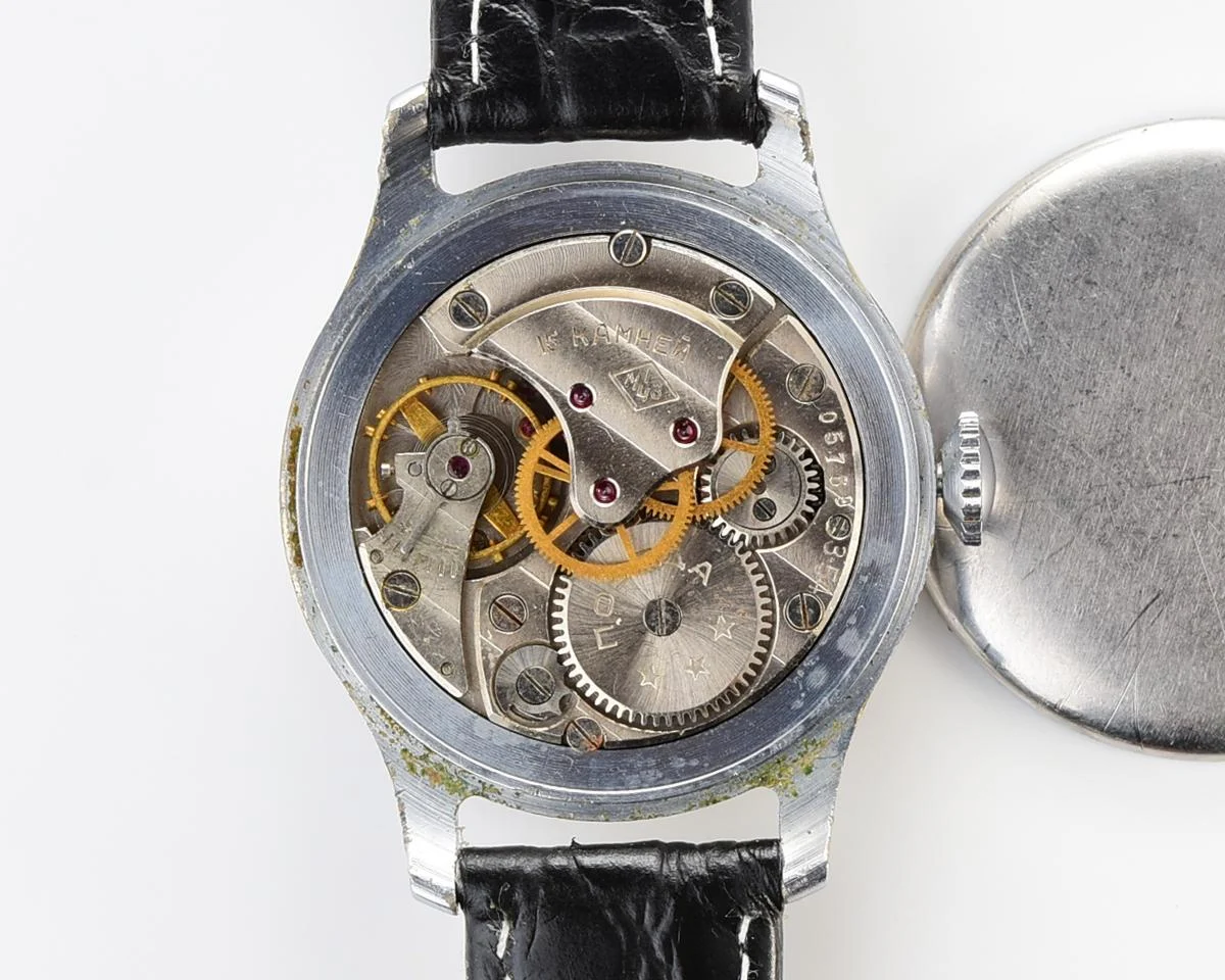 Vintage Pobeda watch with central seconds hand and diamond shaped crown, from 1954!