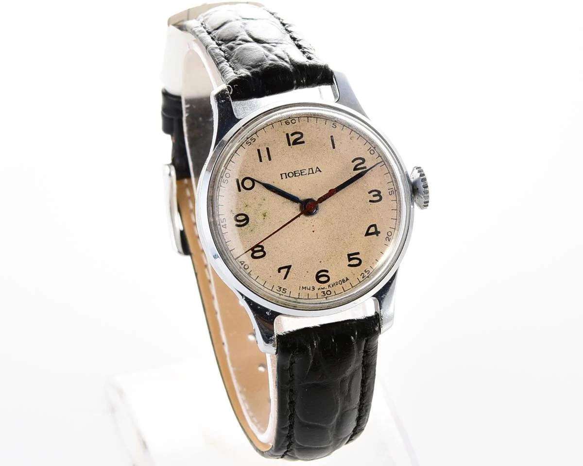 Vintage Pobeda watch with central seconds hand and diamond shaped crown, from 1954!