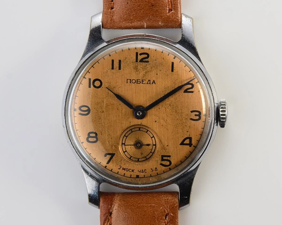 Vintage Soviet Pobeda watch with bronze dial, 3rd quarter of 1955