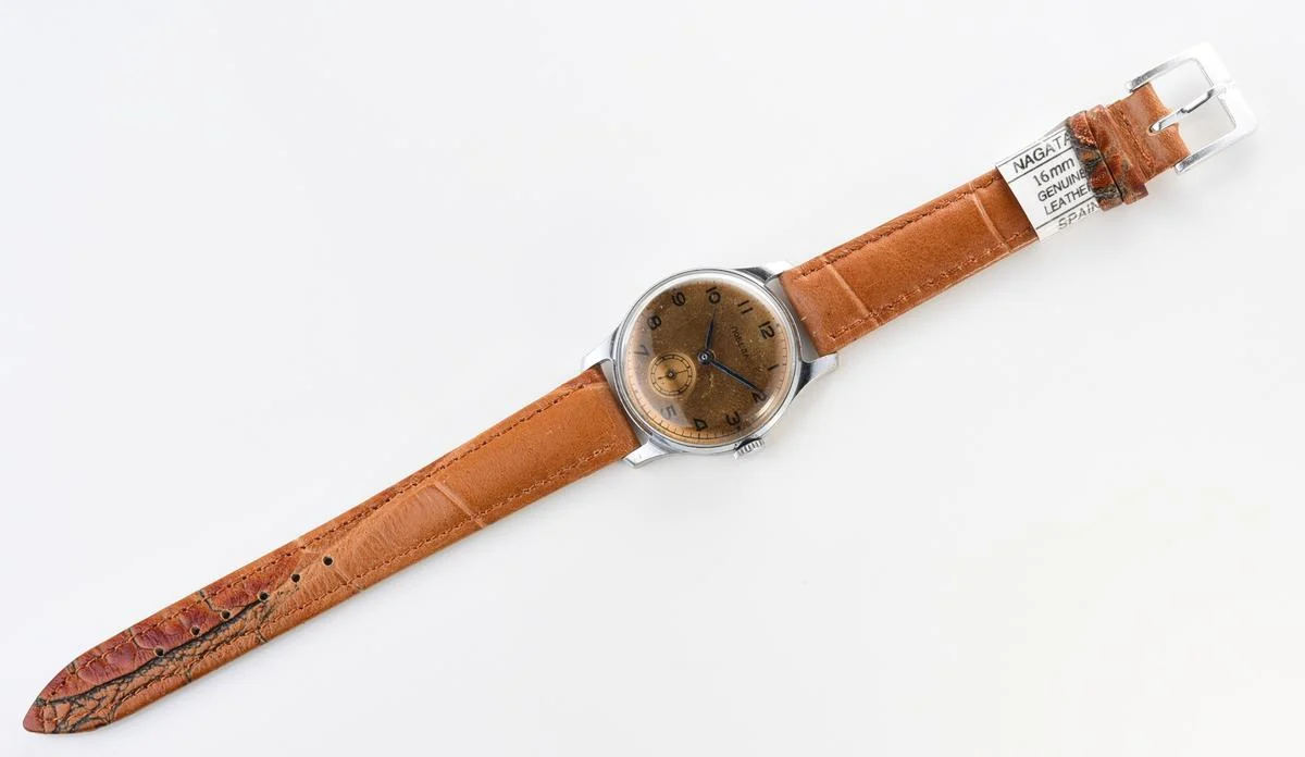 Vintage Soviet Pobeda watch with bronze dial, 3rd quarter of 1955