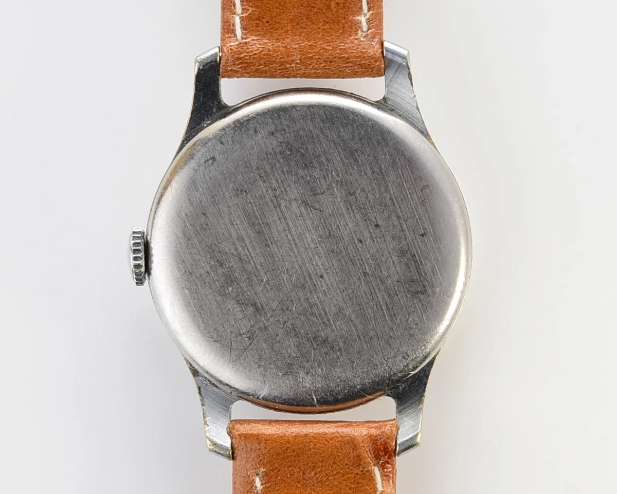 Vintage Soviet Pobeda watch with bronze dial, 3rd quarter of 1955
