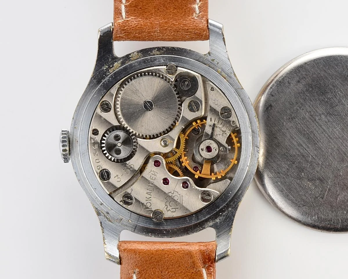 Vintage Soviet Pobeda watch with bronze dial, 3rd quarter of 1955